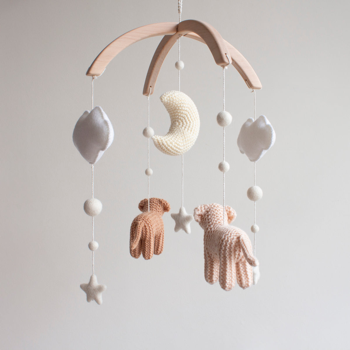 Baby mobile with Crochet cream moon surrounded by natural white wool clouds , balls and stars for neutral celestial nursery