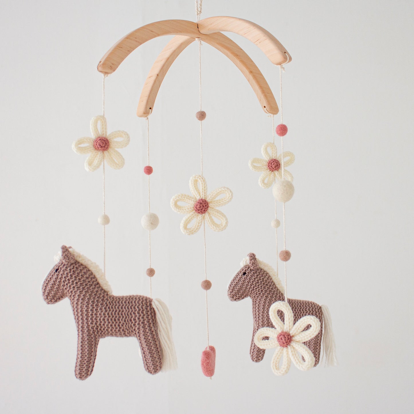 Cottagecore nursery mobile with horses & daisies
