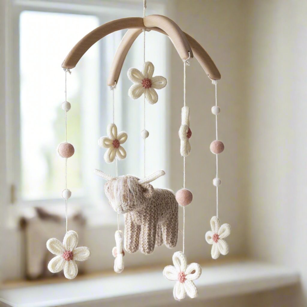 Cow & Daisies nursery mobile in beige and blush