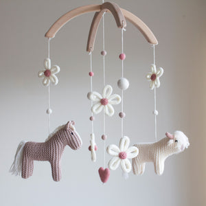 Cottagecore nursery mobile with highland cow, horse, daisies