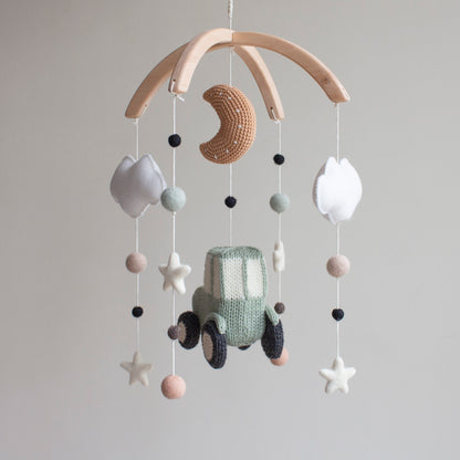 Smooth, untreated solid alder wood cross-arch hanger for a minimalist farm-themed mobile.