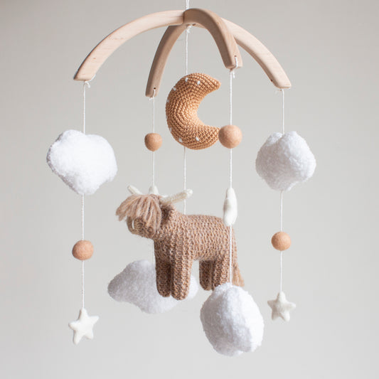 Highland cow baby mobile with boucle clouds, moon in earthy browns