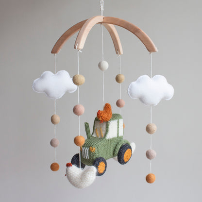 Smooth, untreated solid alder wood cross-arch hanger for a minimalist nursery mobile.