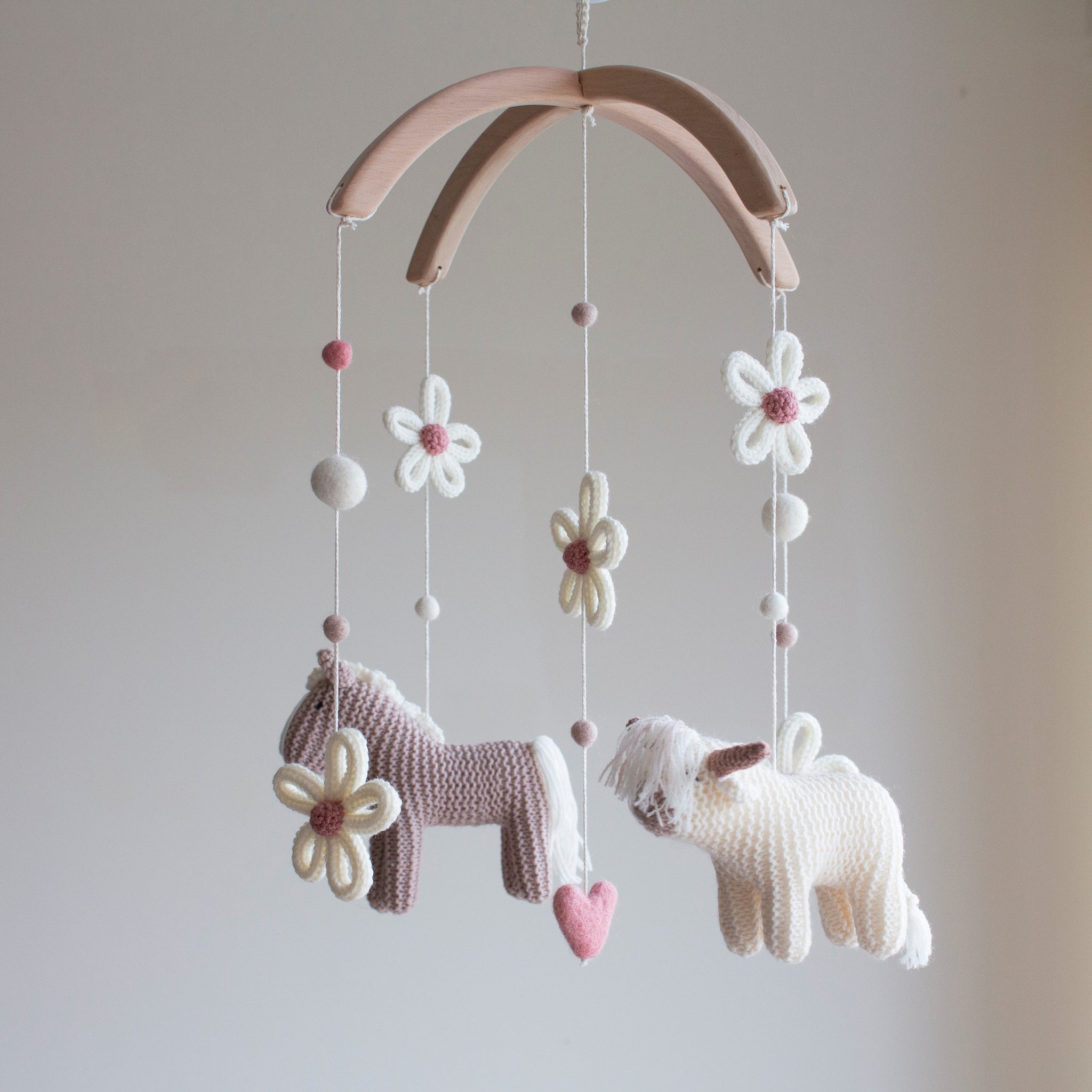 Cottagecore nursery mobile with highland cow, horse, daisies