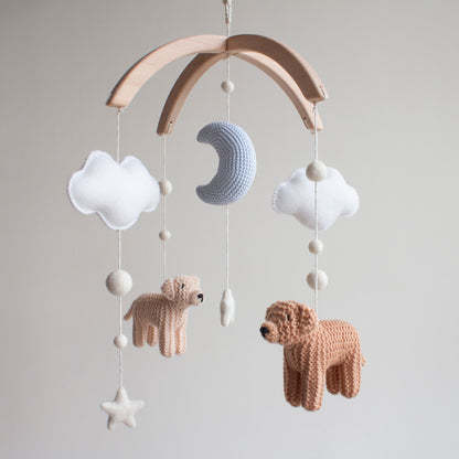 Baby mobile with golden retriever dogs, clouds, and stars on a wooden arch handcrafted in Northern Ireland, United Kingdom is a heirloom Christening gift 