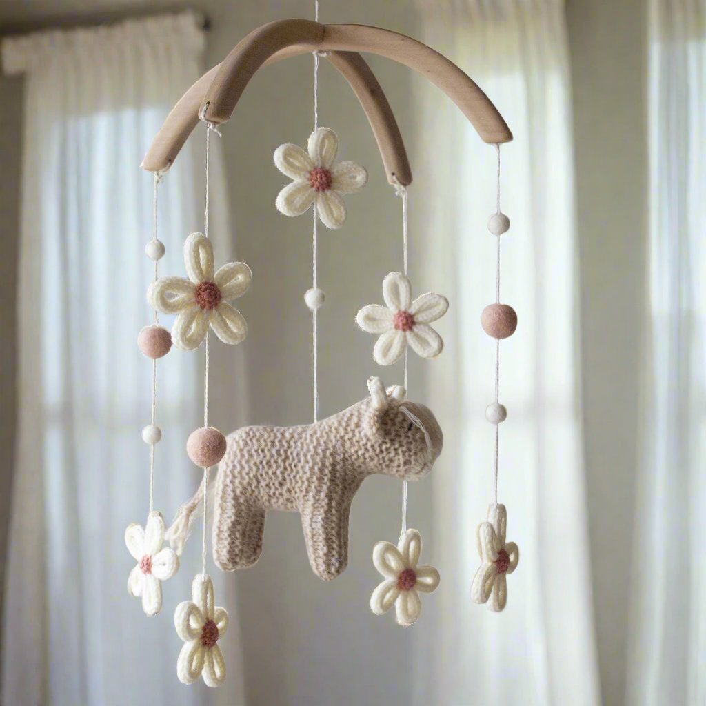 Cow & Daisies nursery mobile in beige and blush