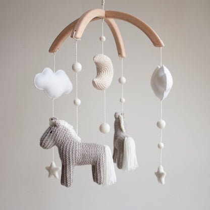 Artisan pony baby mobile—a unique baby shower gift for horse lovers and modern nurseries.