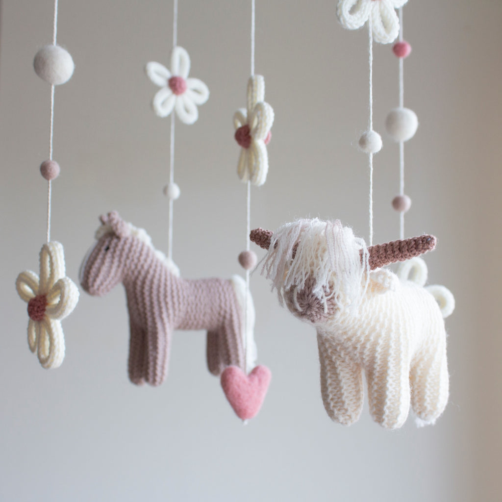 Cottagecore nursery mobile with highland cow, horse, daisies