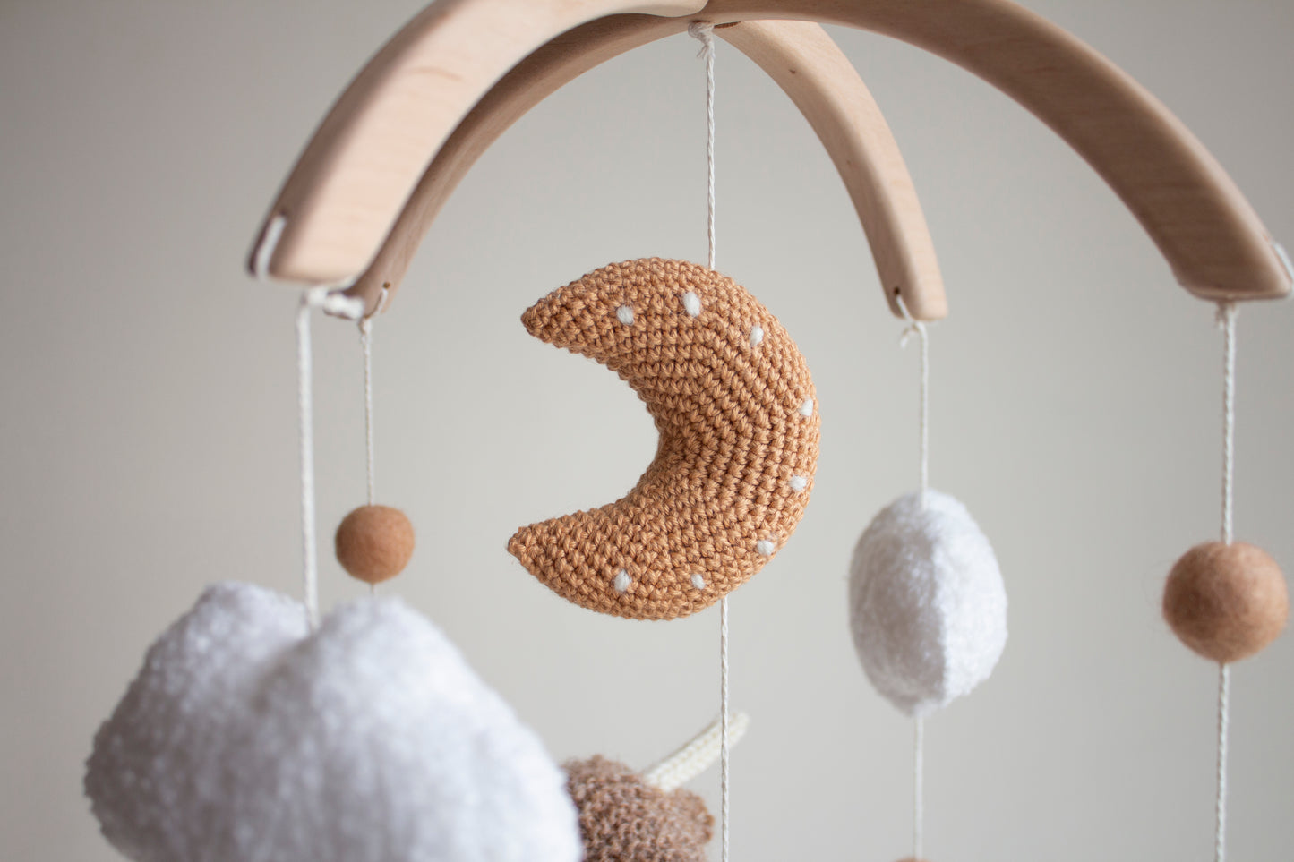 Highland cow baby mobile with boucle clouds, moon in earthy browns