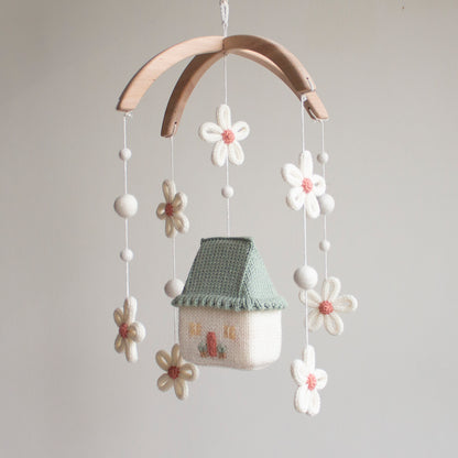 Artisan Daisy Cottage baby mobile—a unique baby shower gift for a botanical or boho nursery.